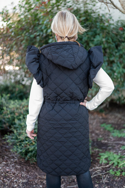 Black Ruffle Sleeve Quilted Puffer Vest by Coastal Couture